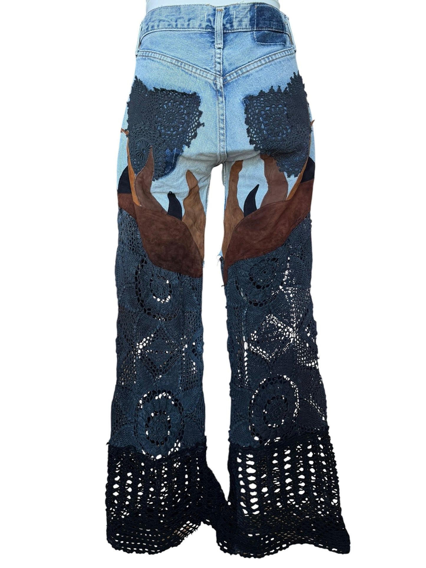 Flare denim in leather and black crochet