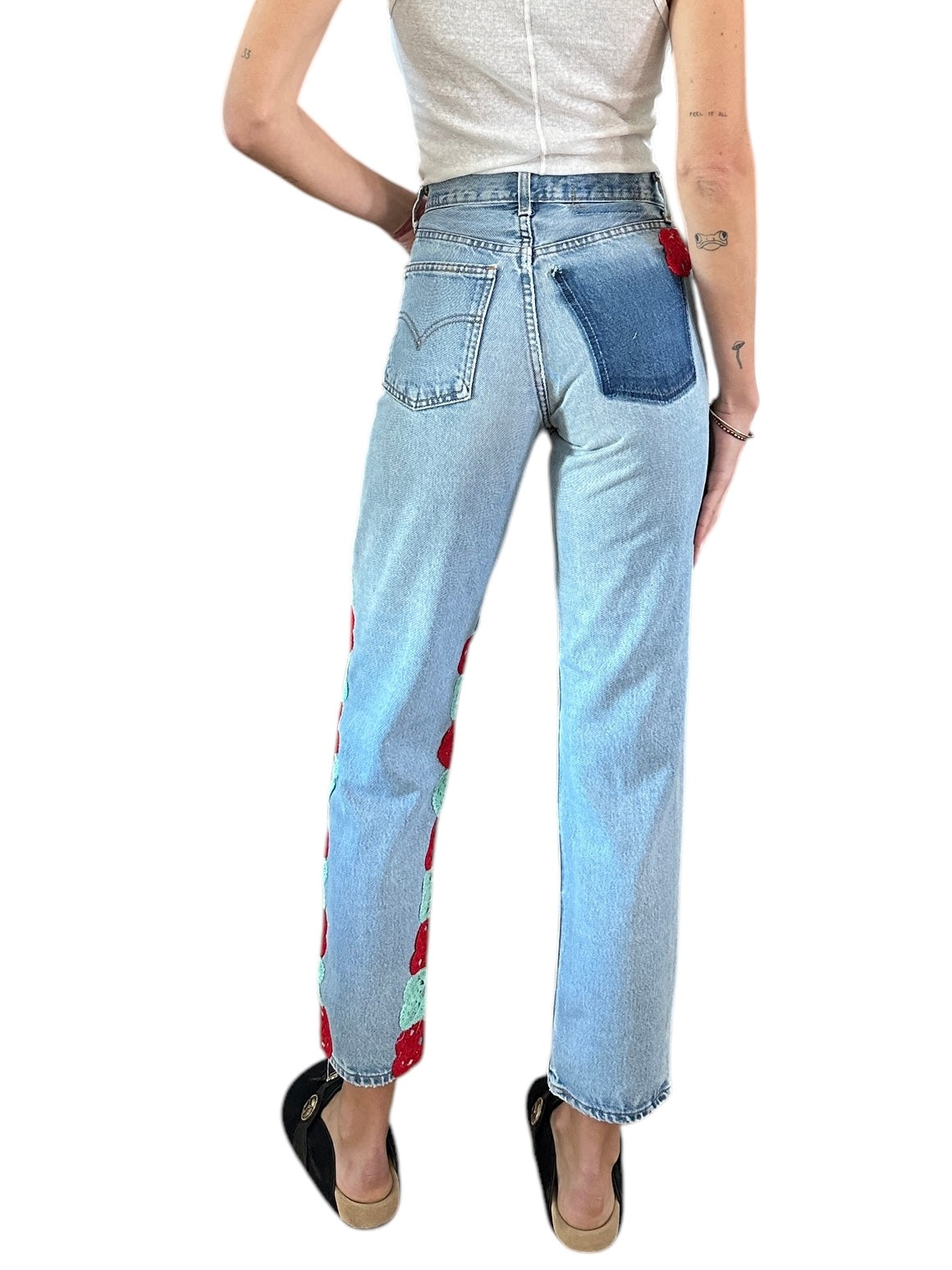 Denim with red and blue crochet applique