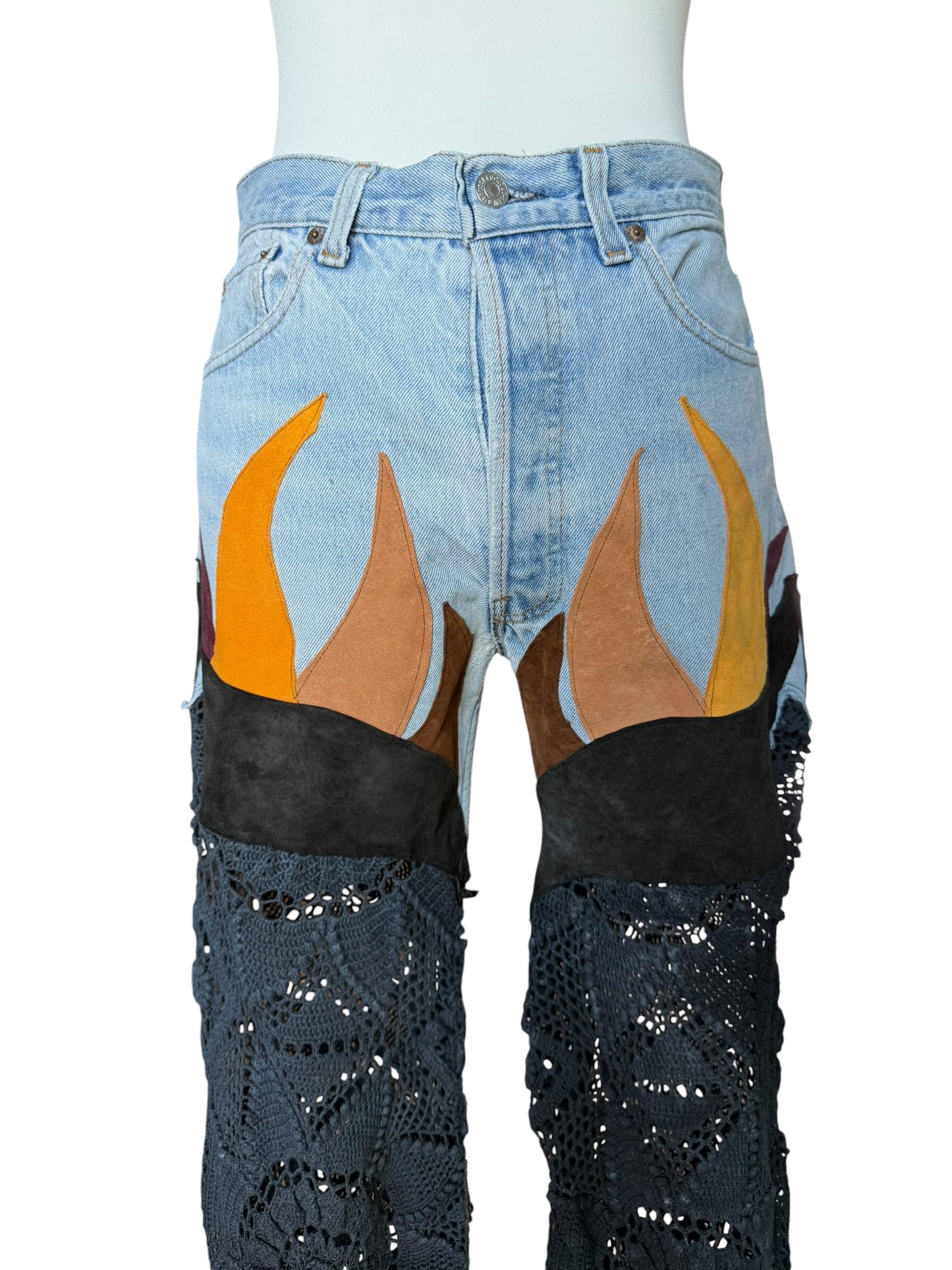 Flare denim in leather and black crochet