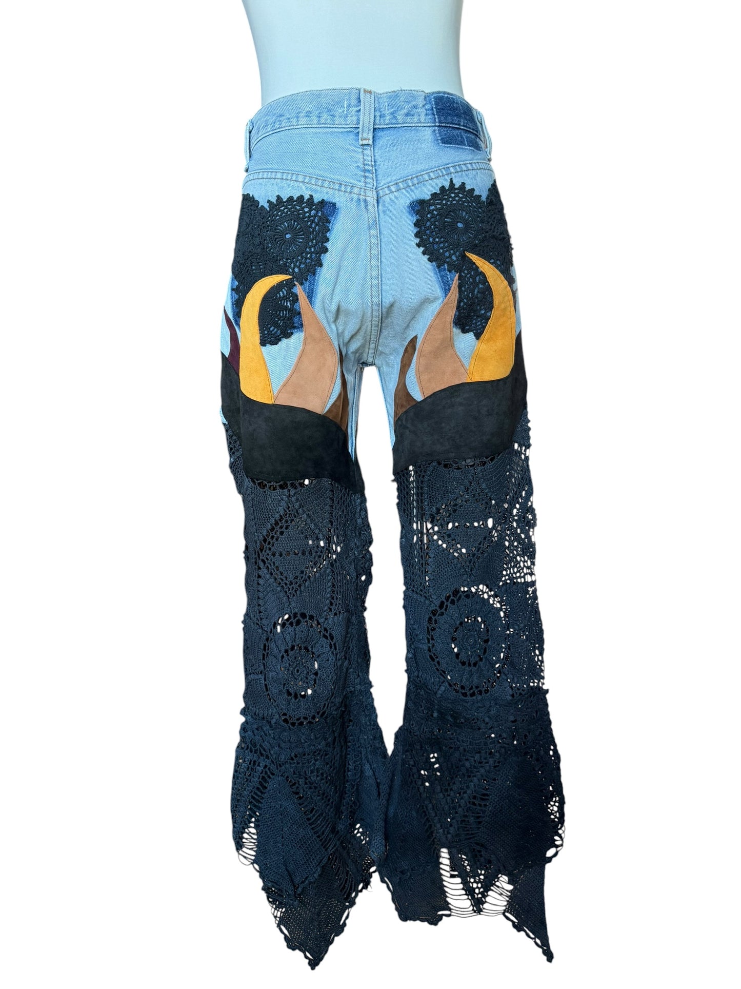 Flare denim in leather and black crochet