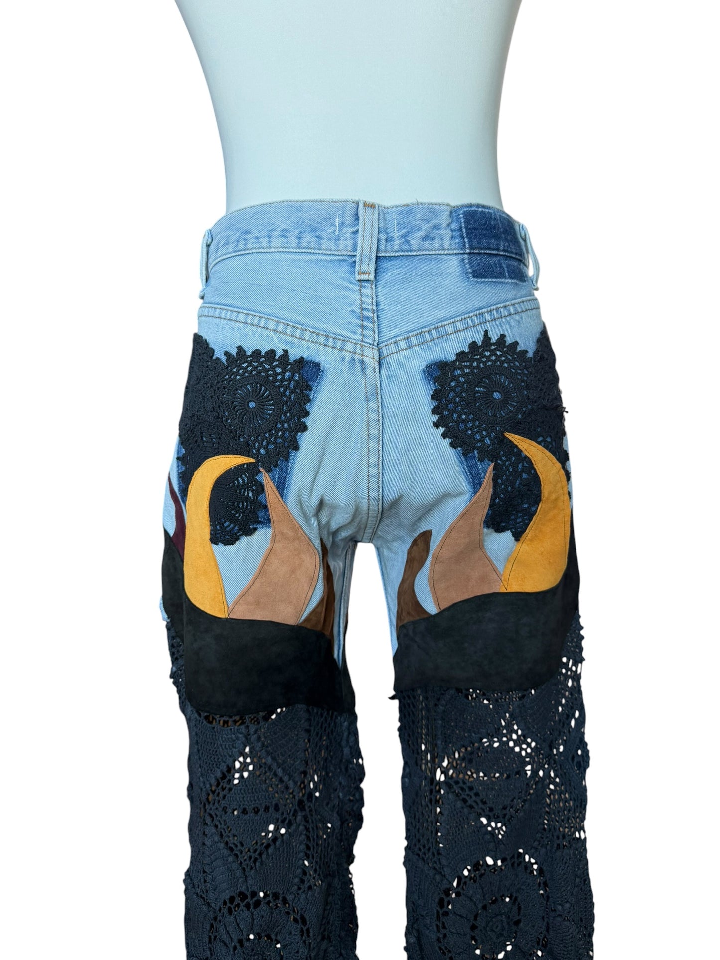 Flare denim in leather and black crochet