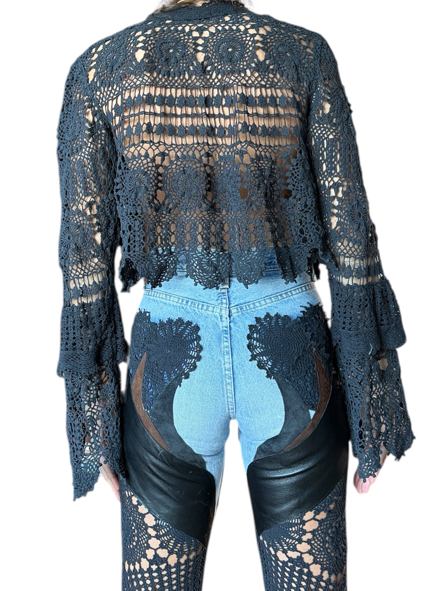 Flare denim in leather and black crochet