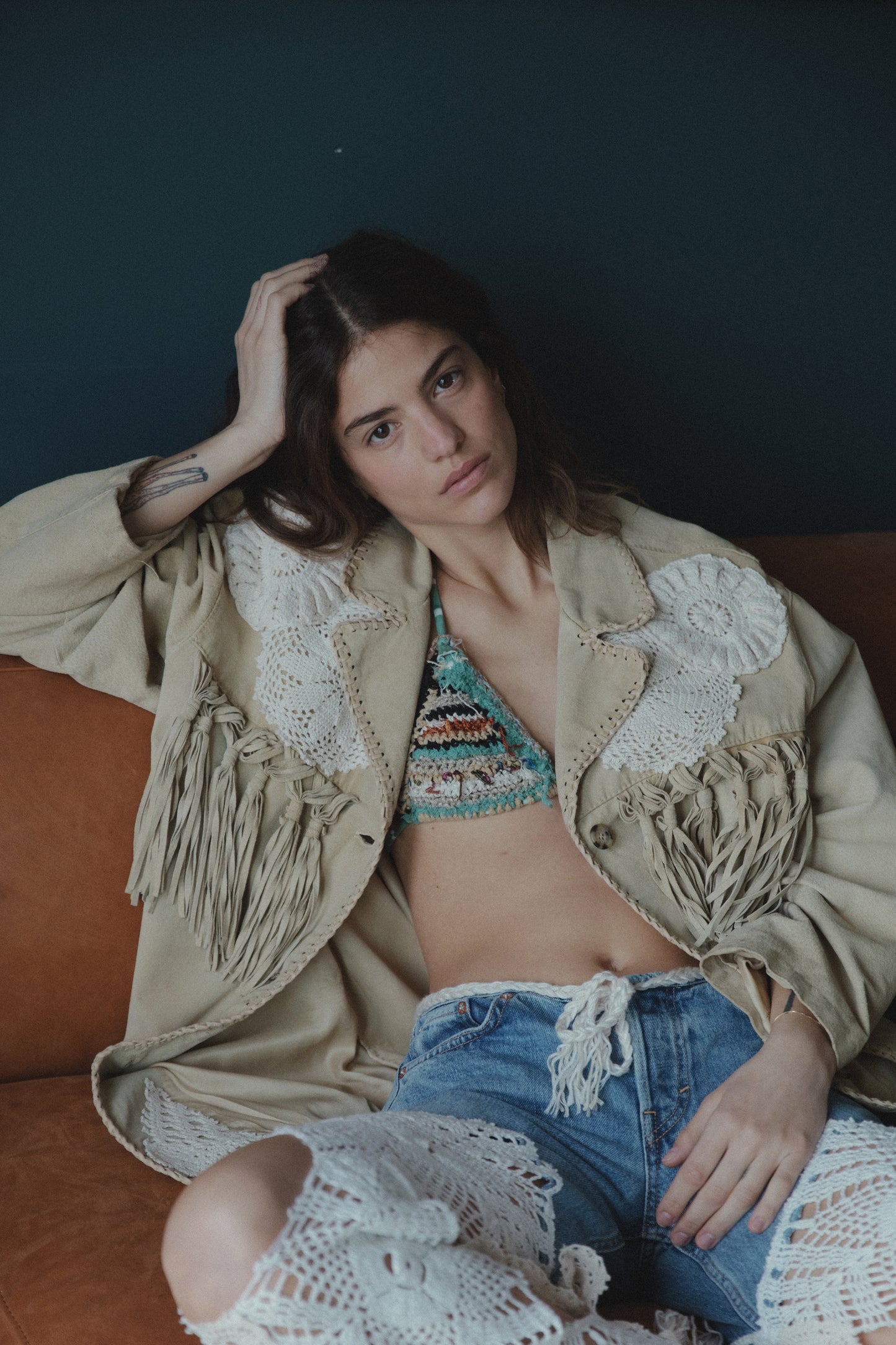 Fringe leather jacket with crochet appliqués